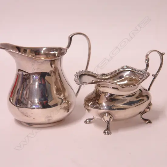 Two silver cream jugs