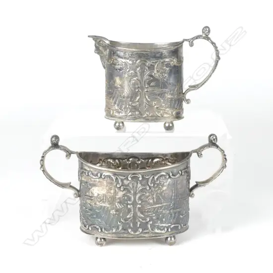 A Dutch silver sugar basin and milk jug