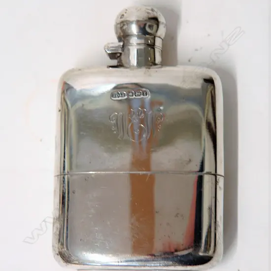 An early 20thC all silver hip flask