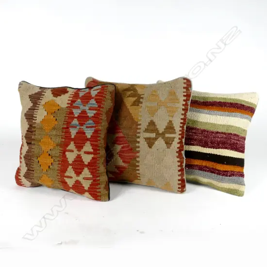 Three kilim faced cushions