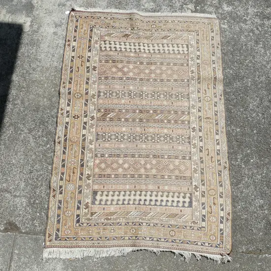 A Shiraz woven rug