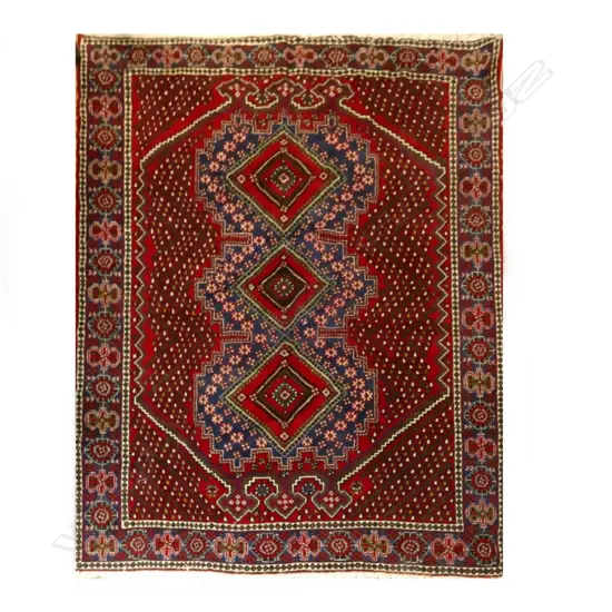 A hand knotted Persian Shiraz tribal rug