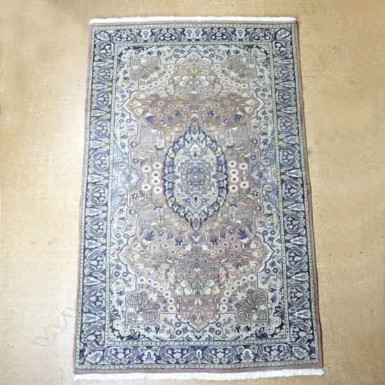 A hand knotted Iranian rug