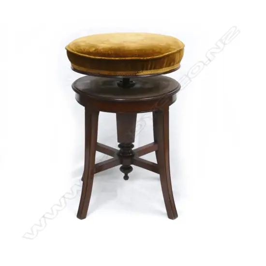 An elegant late Victorian mahogany revolving piano stool