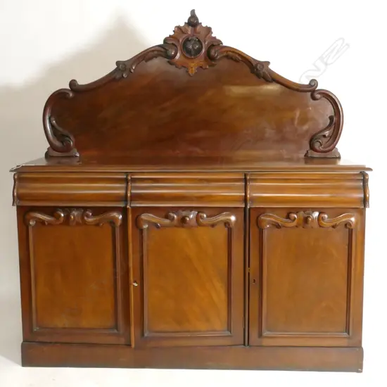A Victorian flame mahogany sideboard