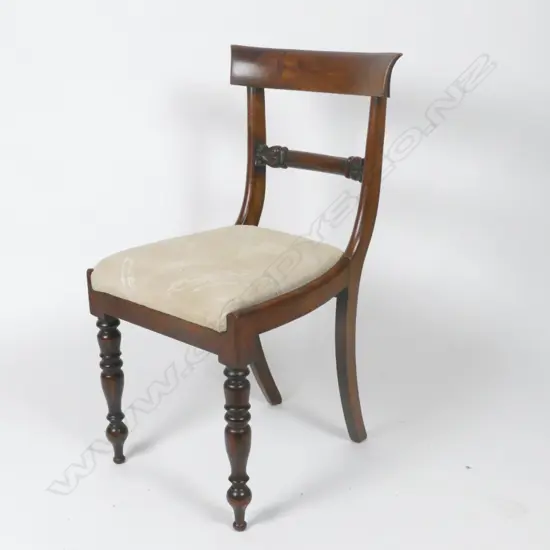 A set of four Regency simulated rosewood bar back dining chairs