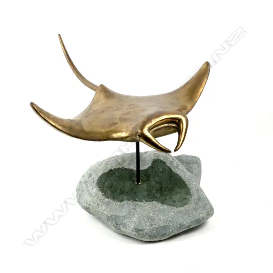 A brass and serpentine manta ray sculpture