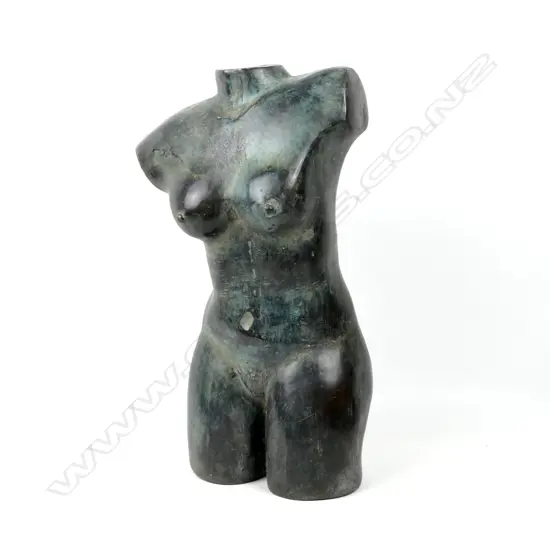 A bronze sculptured female torso