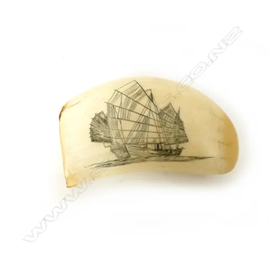 A 20thC scrimshaw whale's tooth