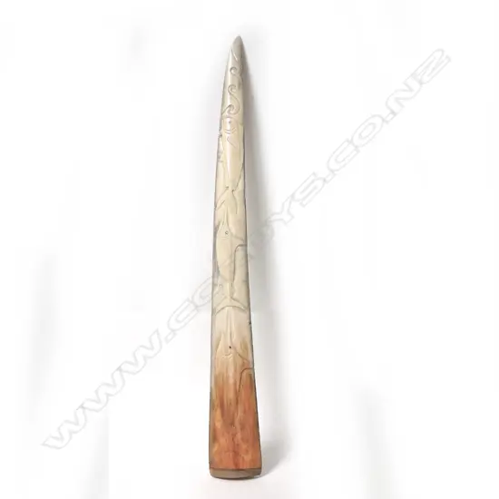 A carved broadbill bill