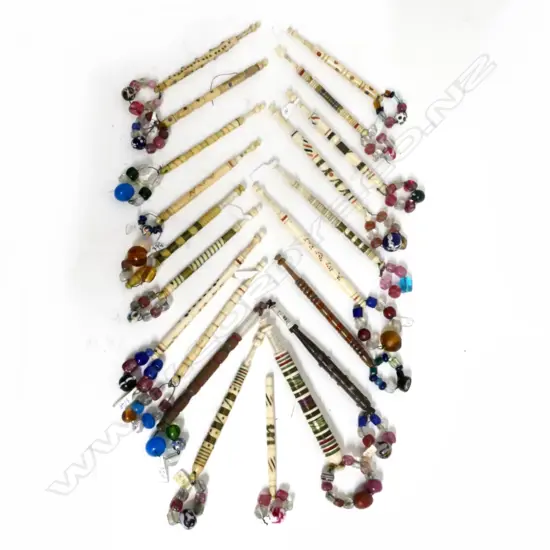 A collection of 20 antique beaded lace bobbins