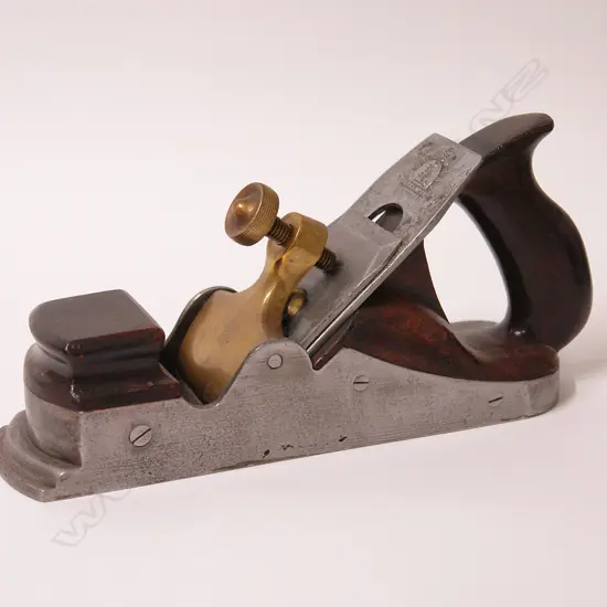 An early 20thC rosewood infill smoothing plane