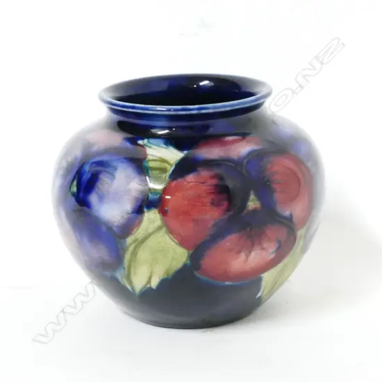 A small William Moorcroft 'Pansy' vase
