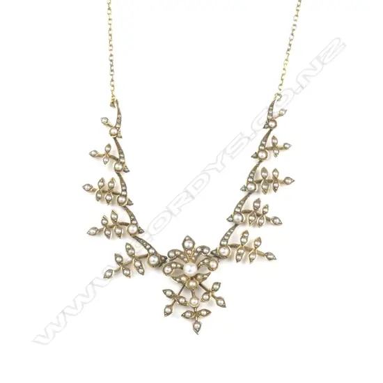 An Edwardian 9ct gold and seed pearl necklace