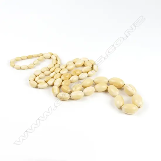 A vintage ivory bead necklace