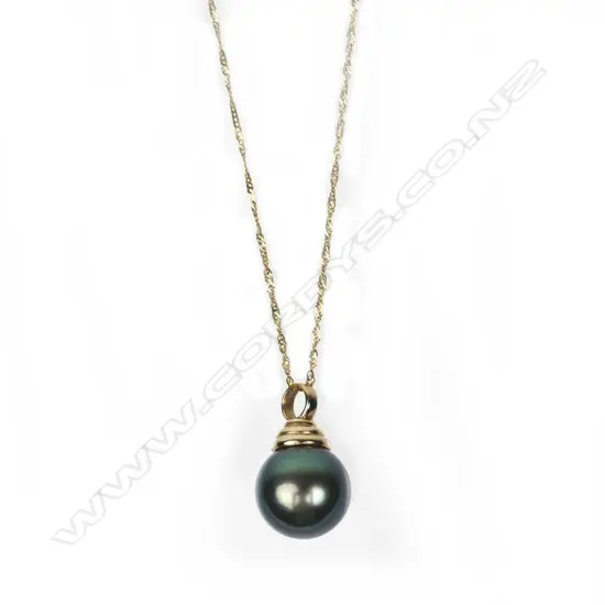 A 9ct. gold and black pearl pendant