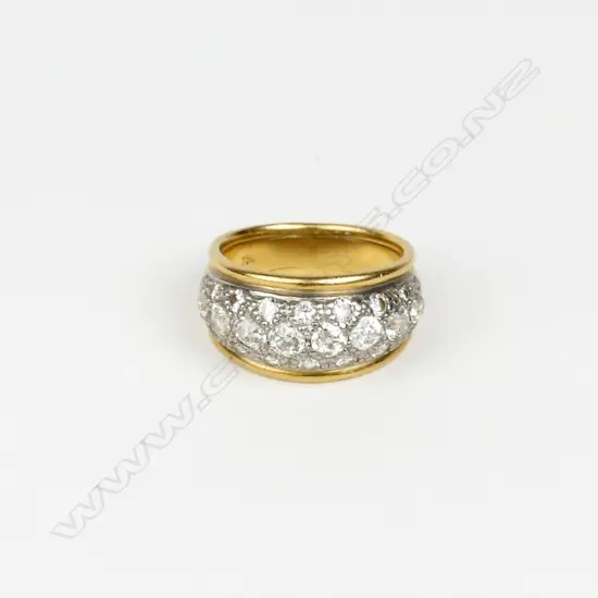 An 18ct. gold and diamond cluster ring