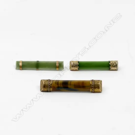 Three colonial gold capped bar brooches