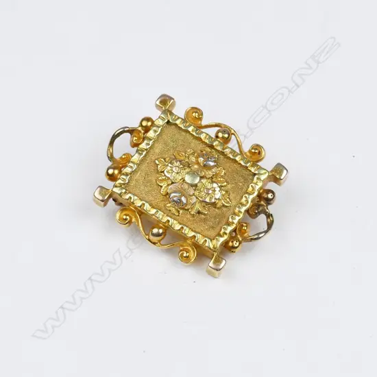 An 18ct. gold brooch