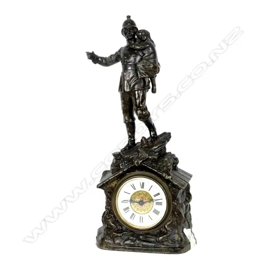 A Victorian spelter mantel timepiece