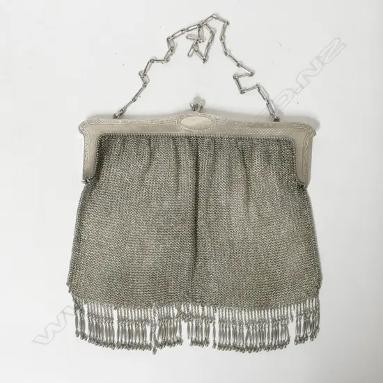 A large sterling silver framed integral mesh handbag