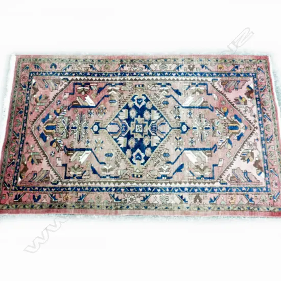 A hand knotted Persian Hamadan rug
