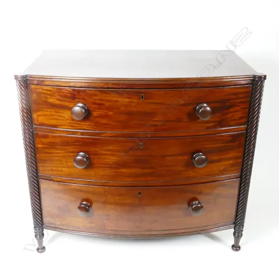 A mahogany bowfront chest of three drawers
