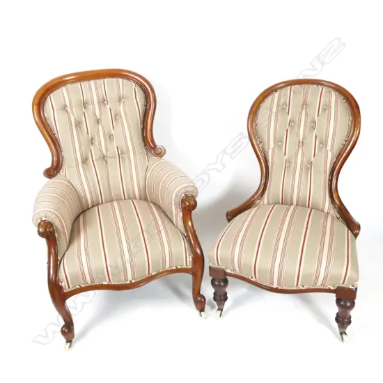 A pair of Victorian mahogany grandfather and grandmother chairs