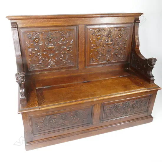 A Victorian oak bench seat with box base
