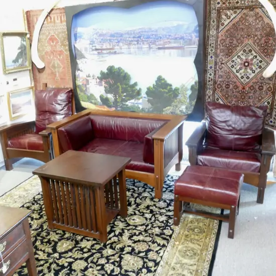 A mahogany American Arts and Crafts Mission style three piece suite