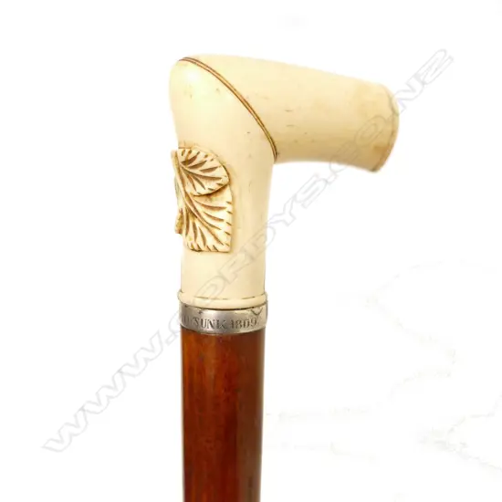 A wood and bone walking stick