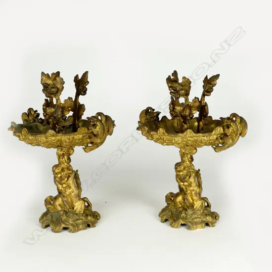 A pair of 19thC gilt ormolu stands