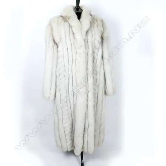 A full length Arctic fox fur coat