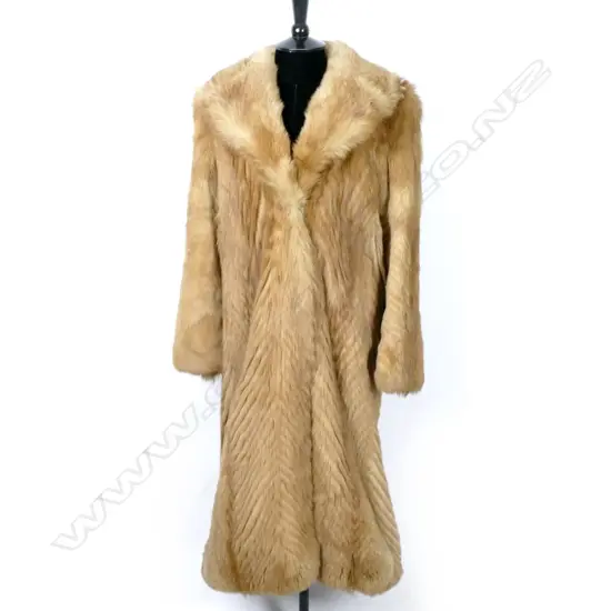 A full length red fox fur coat