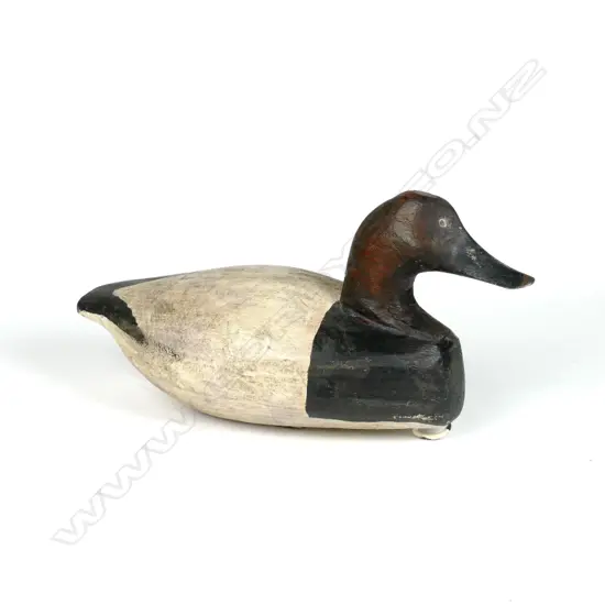 A large wide-body canvasback red-head wooden duck decoy