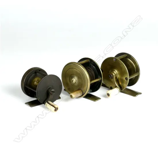 Three vintage brass reels