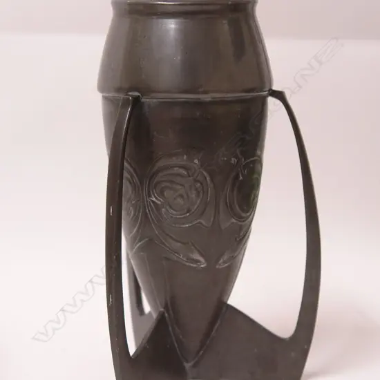 A Tudric pewter Archibald Knox bombe form vase