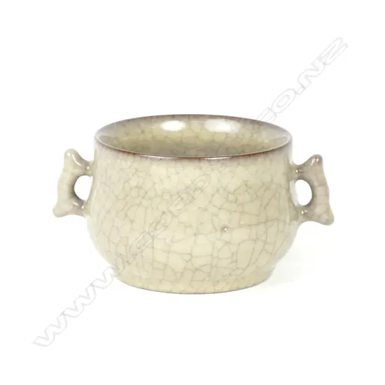 A small Chinese two-handled porcelain dish