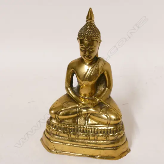 A Tibetan polished bronze Buddha