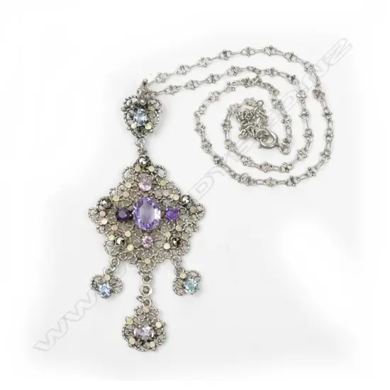 A vintage European jewelled silver pendant necklace