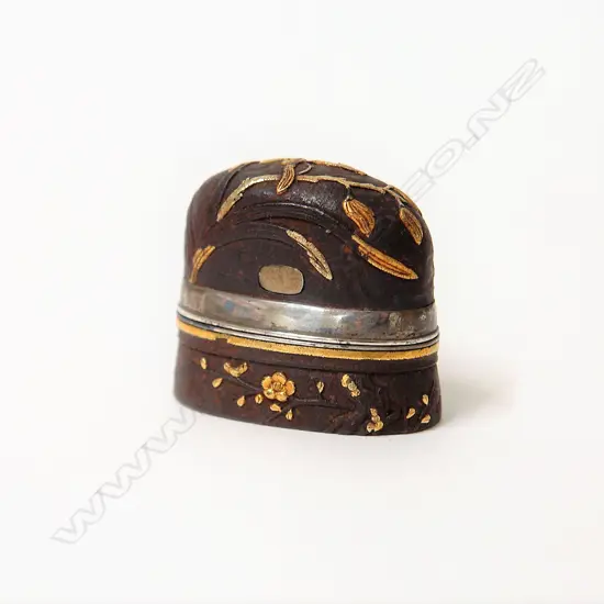 A 19thC or earlier Japanese steel and decorative gold applied sword fitting snuff box