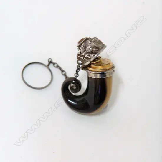 An early 19thC Scottish small ram's horn and silver finger suspended vinaigrette