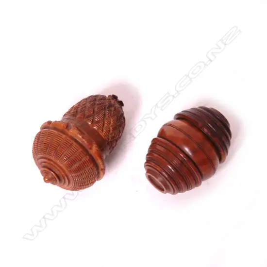 Two Victorian coquilla nut nutmeg graters