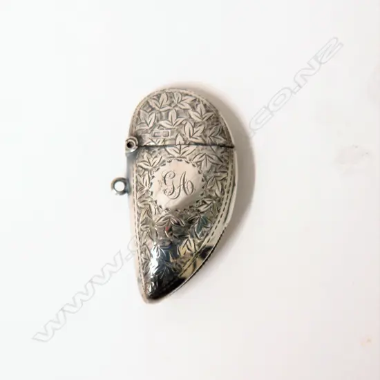 An Edwardian silver uncommon mussel shell form vesta