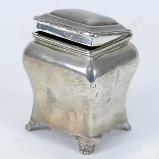 An early 1900s silver tea caddy