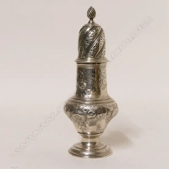 A George III silver vase shaped caster