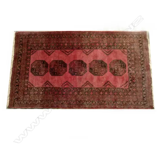 A hand knotted Turkoman carpet