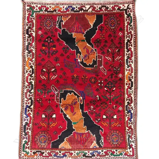 A small hand knotted Persian pictorial rug