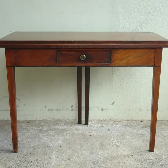 A George III flame mahogany supper table