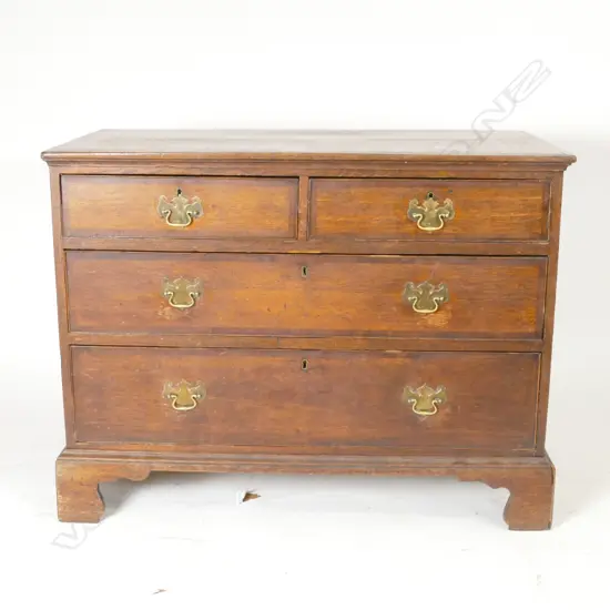 A Georgian flat front chest of four drawers
